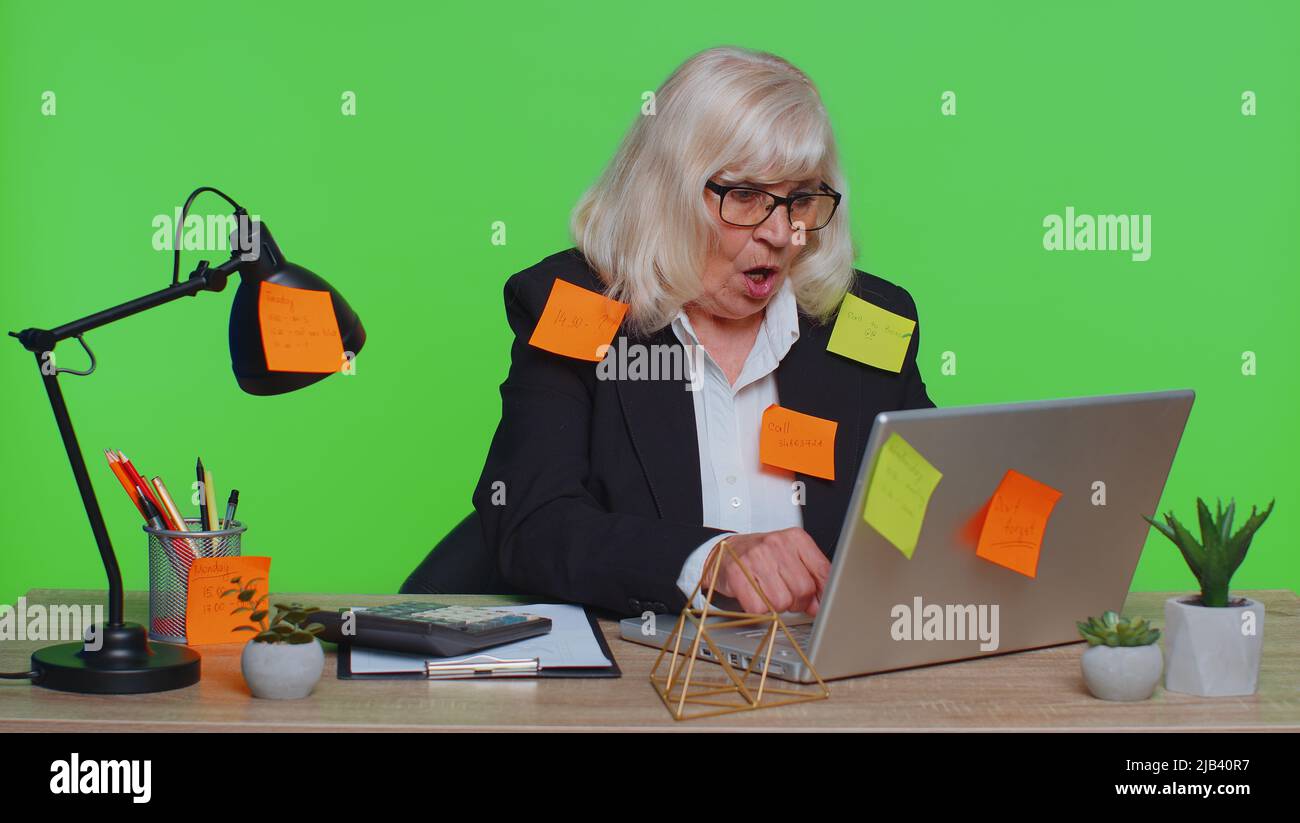 Tired exhausted fatigue senior business woman office employee manager