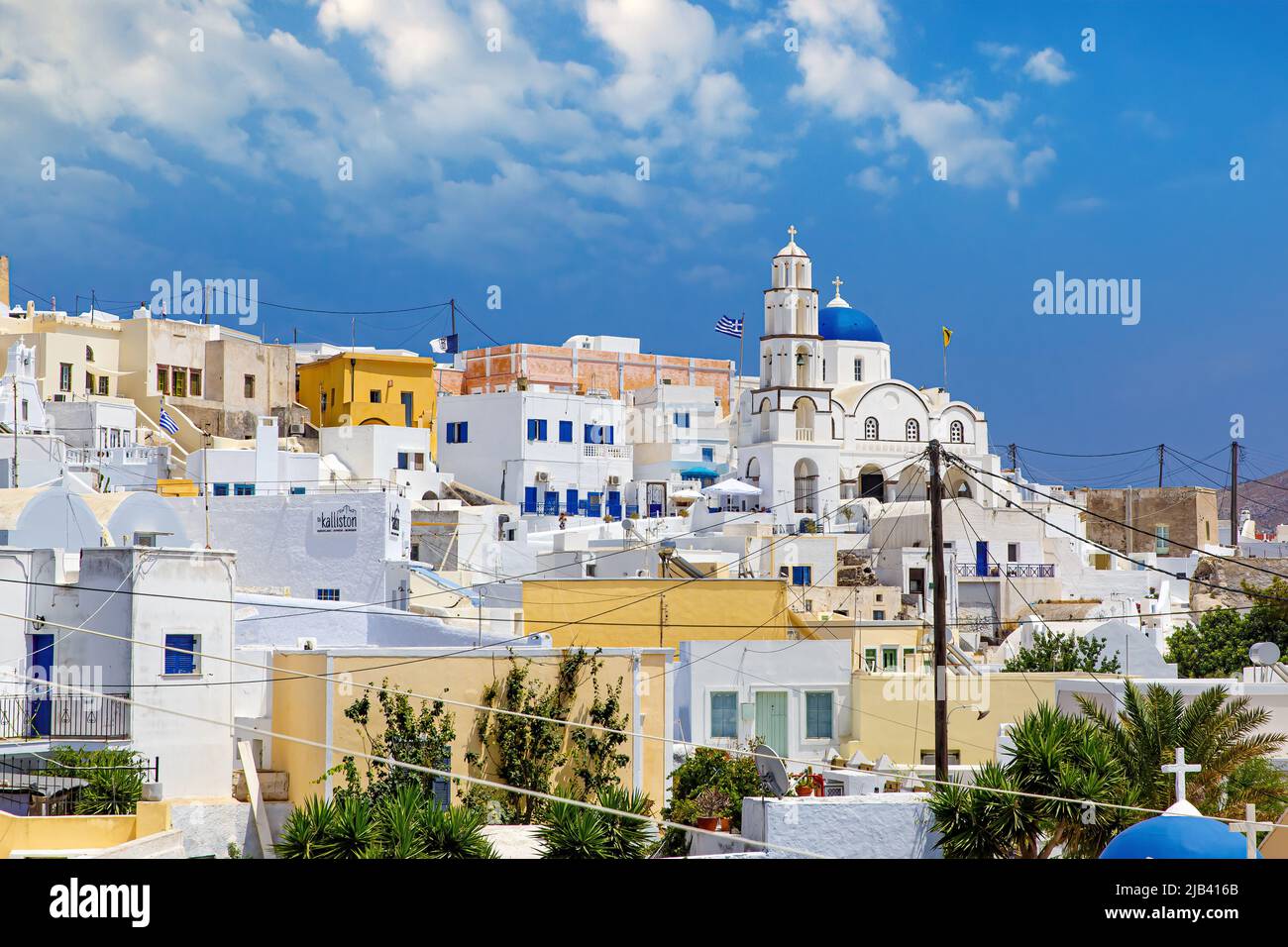 Traditional white architecture village on the center of Santorini ...