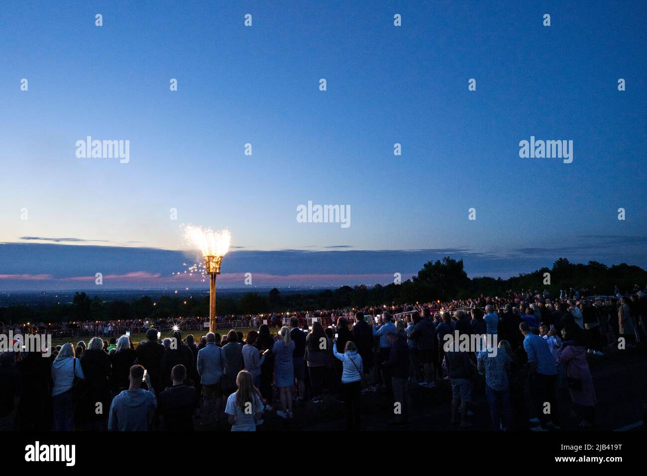 Epsom Downs, Surrey, UK, 2nd June 2022. The Platinum Jubilee beacon is lit at 9.45pm to celebrate 70 years of the reign of Queen Elizabeth the Second. This is one of several beacons lit simultaneously around the UK. Stock Photo