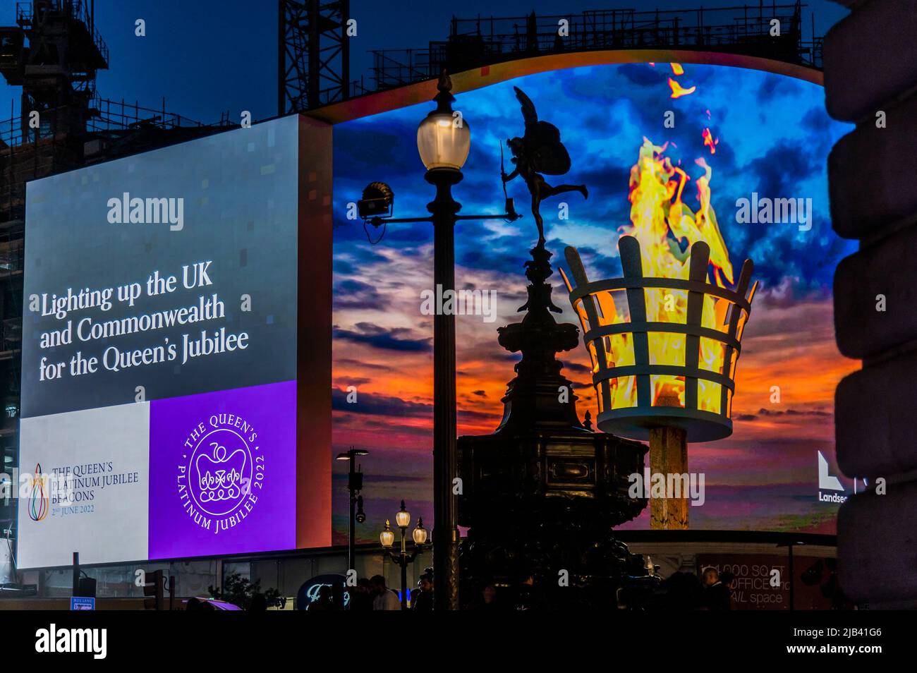 London, UK. 02nd June, 2022. Crowds in Piccadilly Circus as beacons are lit across the world in