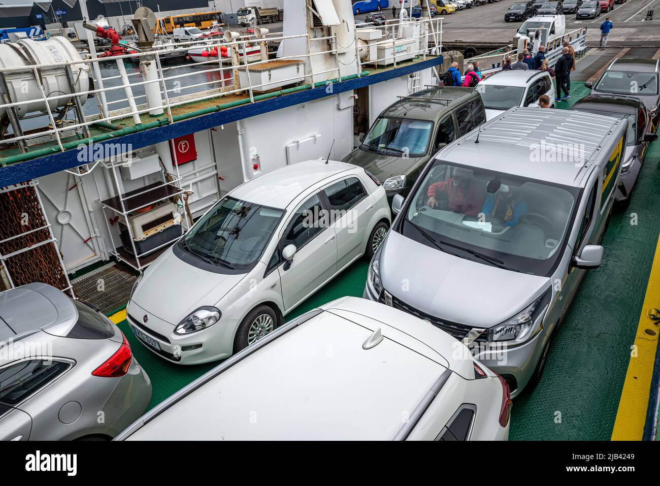 Cars on the ferry from Klaksvik to Sydradalur on Kalsoy Island, Faroe Islands Stock Photo