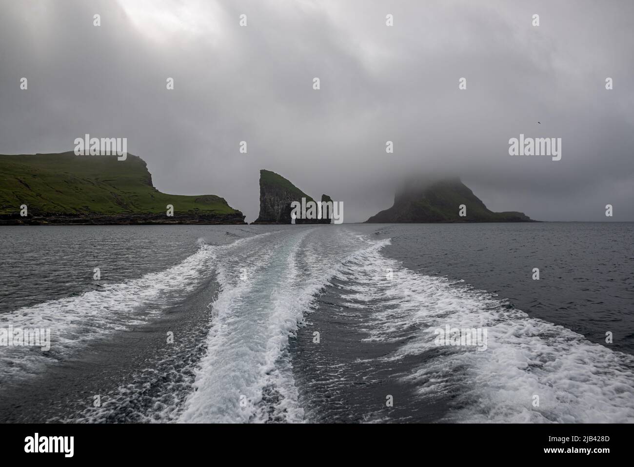 Drangarnir rock formation on Vagar Island seen from a boat, Faroe ...