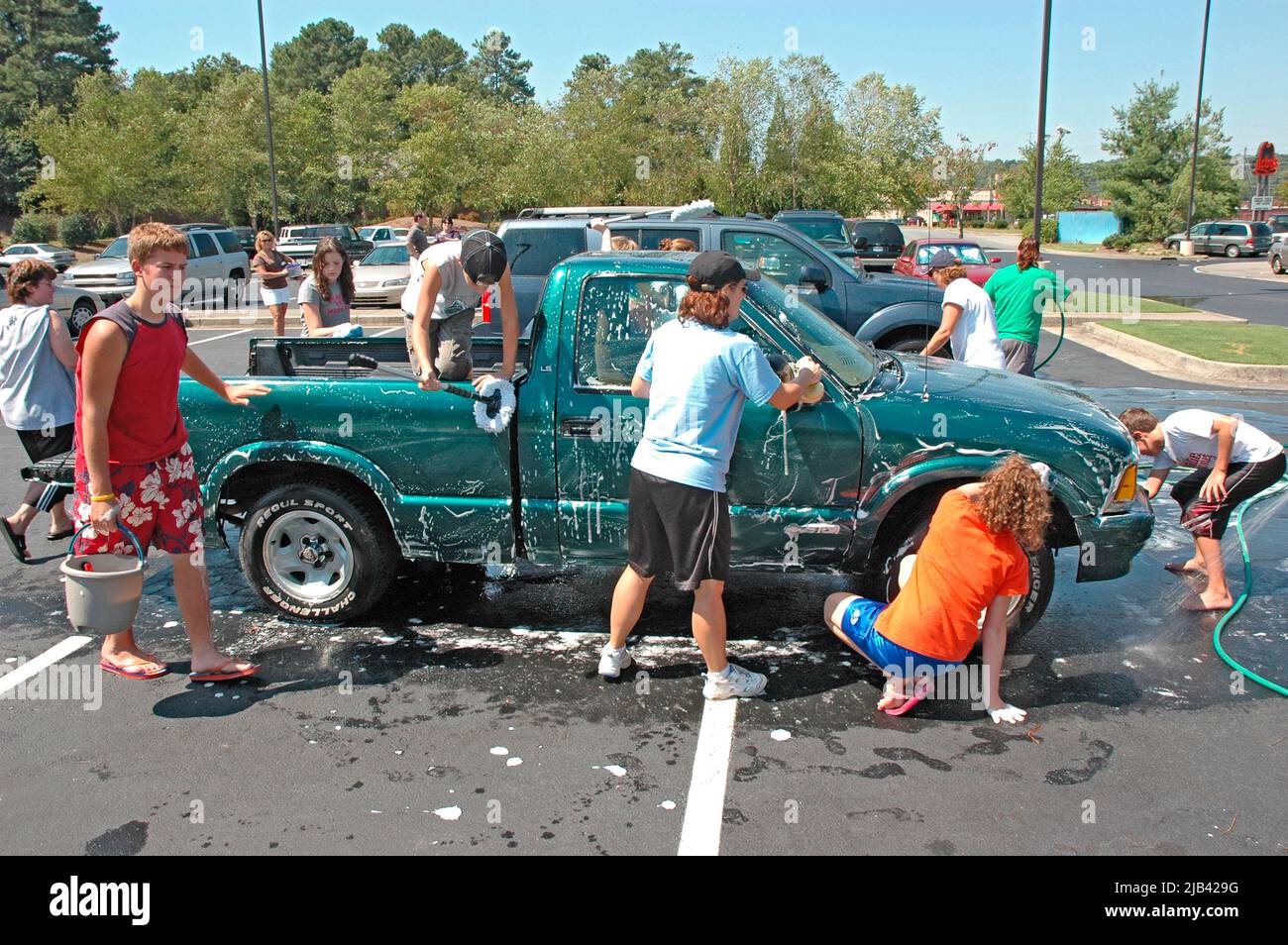 Teen Atlanta Christian church group has a donation car wash to help victims of Katrina Hurricane in LA Gulf Coast of USA Stock Photo