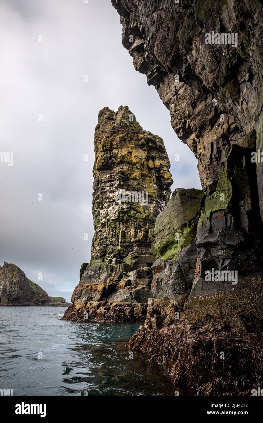 Drangarnir rock formation on Vagar Island seen from a boat, Faroe ...