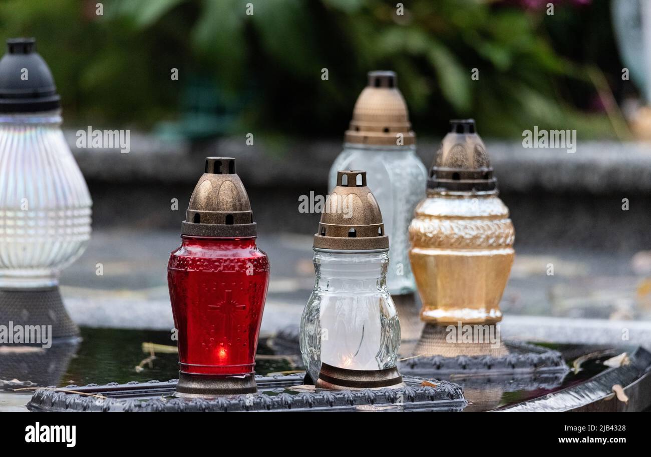 All Saints' Day, burning candles and flowers on the graves. Catholic