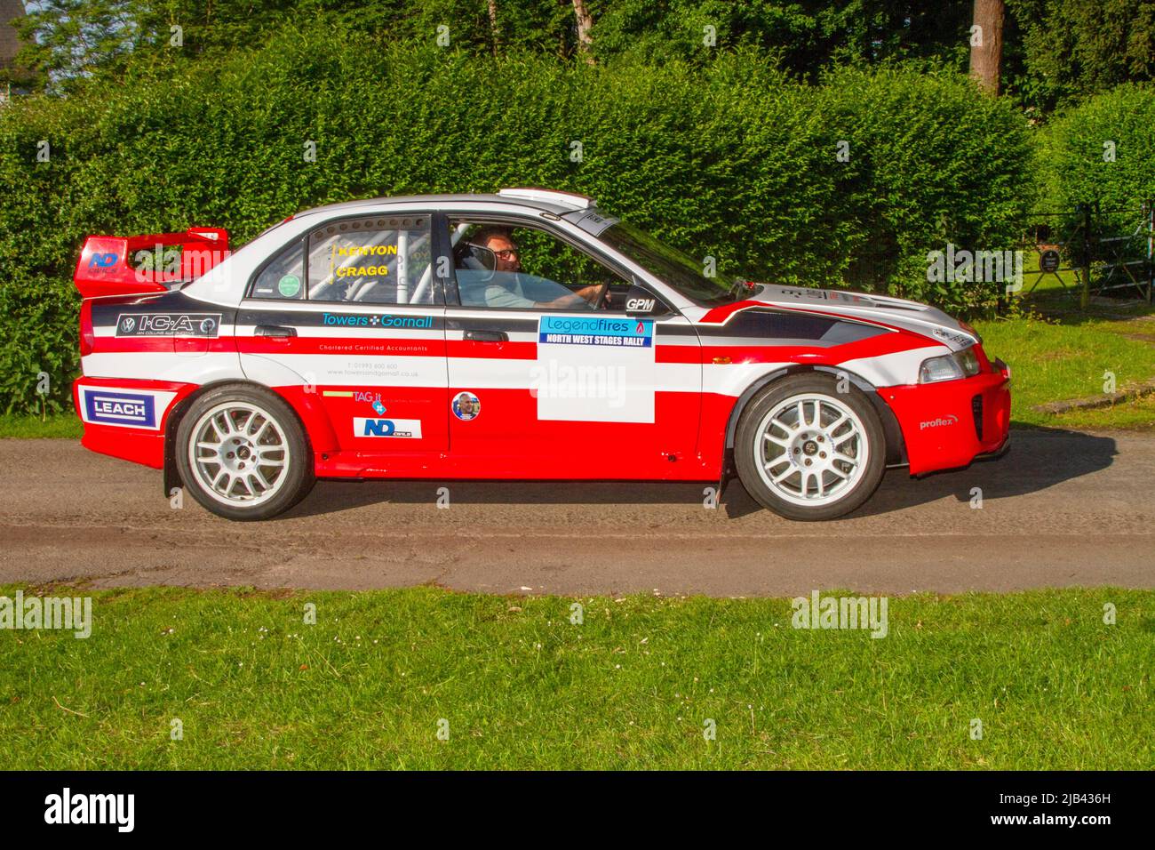 1996 90s nineties Mitsubishi Lancer rally car. Kenyon & Gragg, Kenny, north west stages, red white, arriving in Worden Park Motor Village for the Leyland Festival, UK Stock Photo