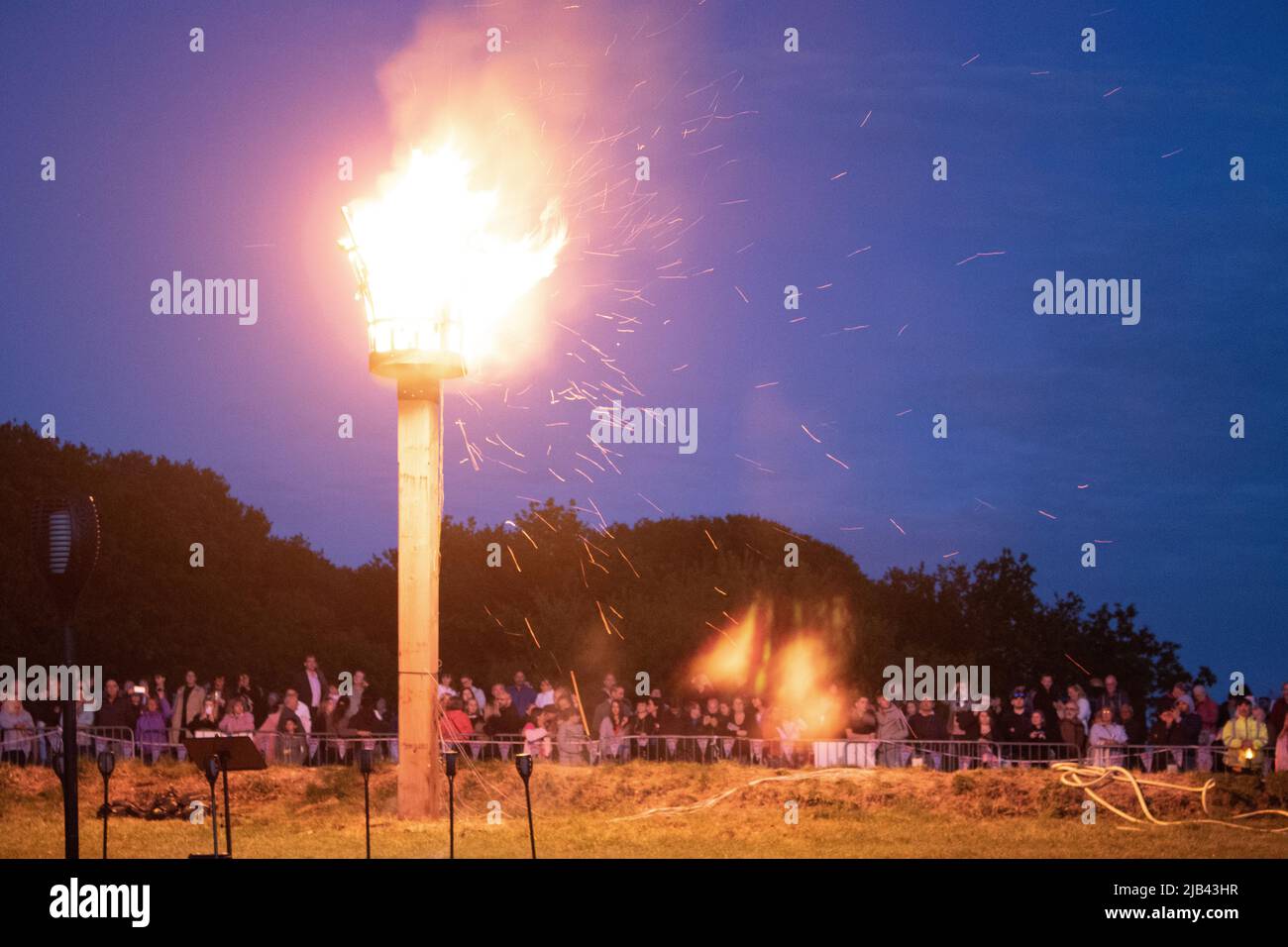 Epsom Downs, Surrey, UK. 2nd June, 2022. The Platinum Jubilee Beacon was lit at 9.45pm on Epsom Downs in Surrey, part of the celebrations for the 70 year reign of the British monarch Queen Elizabeth II. Credit: Julia Gavin/Alamy Live News Stock Photo