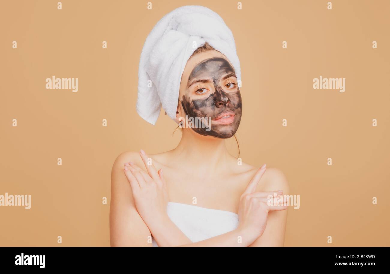 Woman spa mask half-face beauty concept. Mud facial mask, face clay ...