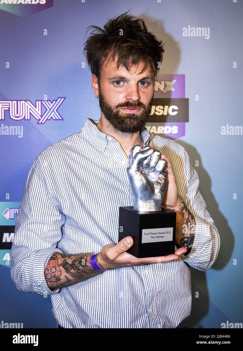 2022-06-02 22:58:12 AMSTERDAM - Tim Hofman wins the Power Award during the FunX Music Awards in AFAS Live in Amsterdam. During the award show, the most important music prizes of the young Netherlands were presented. ANP RAMON VAN FLYMEN netherlands out - belgium out Stock Photo
