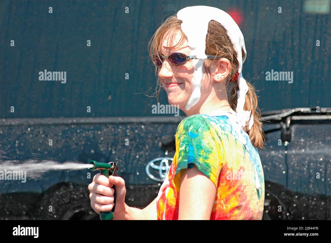 Teen Atlanta Christian church group has a donation car wash to help victims of Katrina Hurricane in LA Gulf Coast of USA Stock Photo