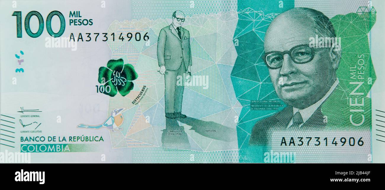 Colombian Money One Hundred Thousand Pesos On White Background Stock colombian-money-one-hundred-thousand-pesos-on-white-background-stock