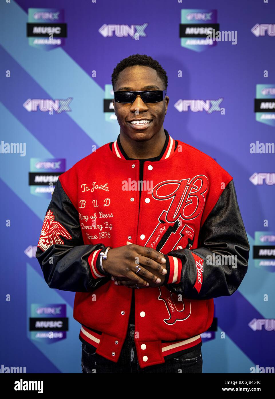 2022-06-02 20:54:53 AMSTERDAM - Ta Joela on the purple carpet for the FunX Music Awards in AFAS Live in Amsterdam. During the award show, the most important music prizes of the young Netherlands are presented. ANP RAMON VAN FLYMEN netherlands out - belgium out Stock Photo