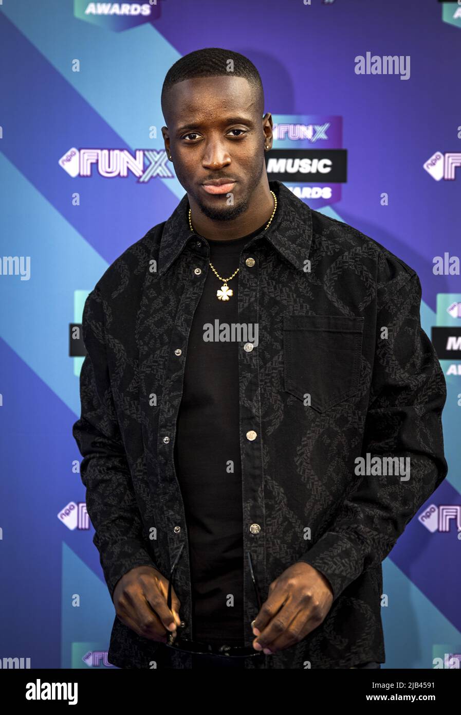 2022-06-02 20:24:07 AMSTERDAM - Dj Lucky Jones on the purple carpet for the FunX Music Awards in AFAS Live in Amsterdam. During the award show, the most important music prizes of the young Netherlands are presented. ANP RAMON VAN FLYMEN netherlands out - belgium out Stock Photo