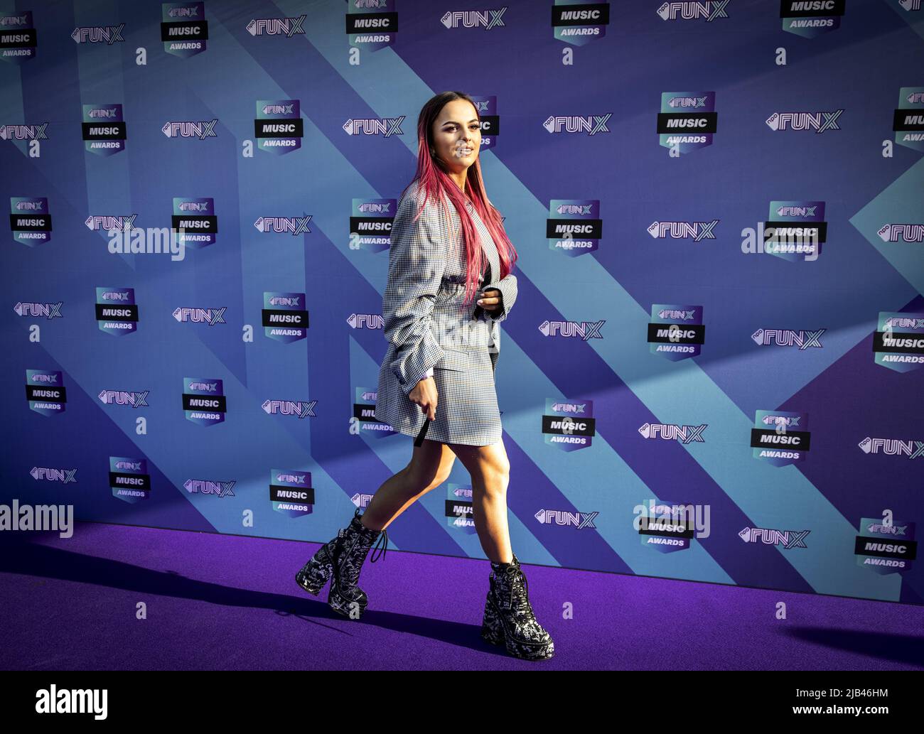 2022-06-02 19:30:59 AMSTERDAM - Demi de Boer on the purple carpet for the FunX Music Awards in AFAS Live in Amsterdam. During the award show, the most important music prizes of the young Netherlands are presented. ANP RAMON VAN FLYMEN netherlands out - belgium out Stock Photo