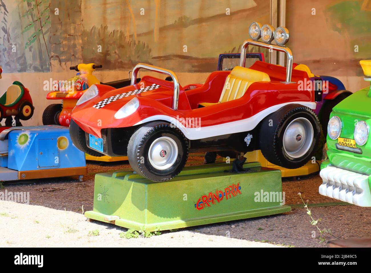 Coin operated amusement kiddie rides Stock Photo Alamy