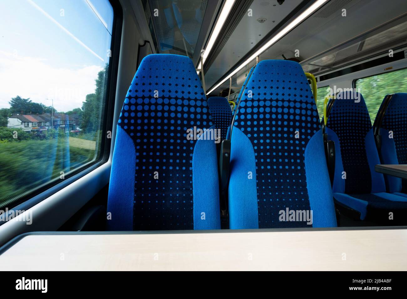 two empty train seats side by side Stock Photo