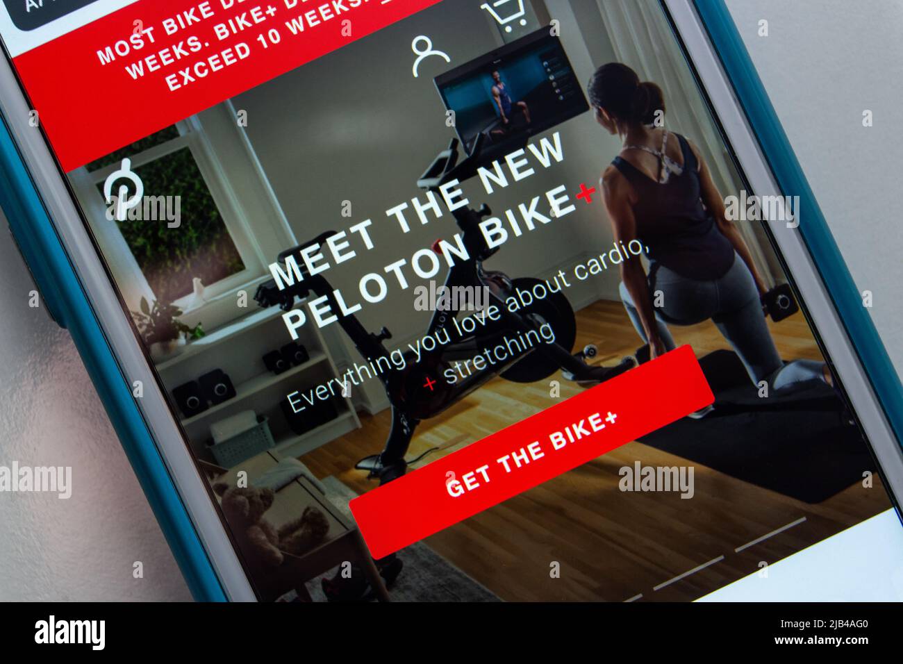 Kumamoto, JAPAN - Dec 17 2020 : Website of Peloton, US exercise equipment includes stationary bicycle and media company founded in 2012 , on iPhone. Stock Photo