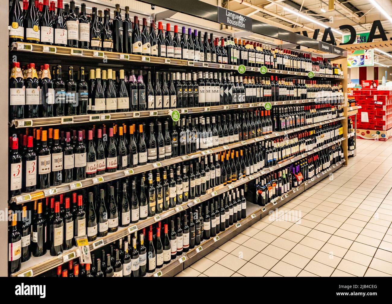 Interior of Super U French Supermarket wine display on sale Stock Photo