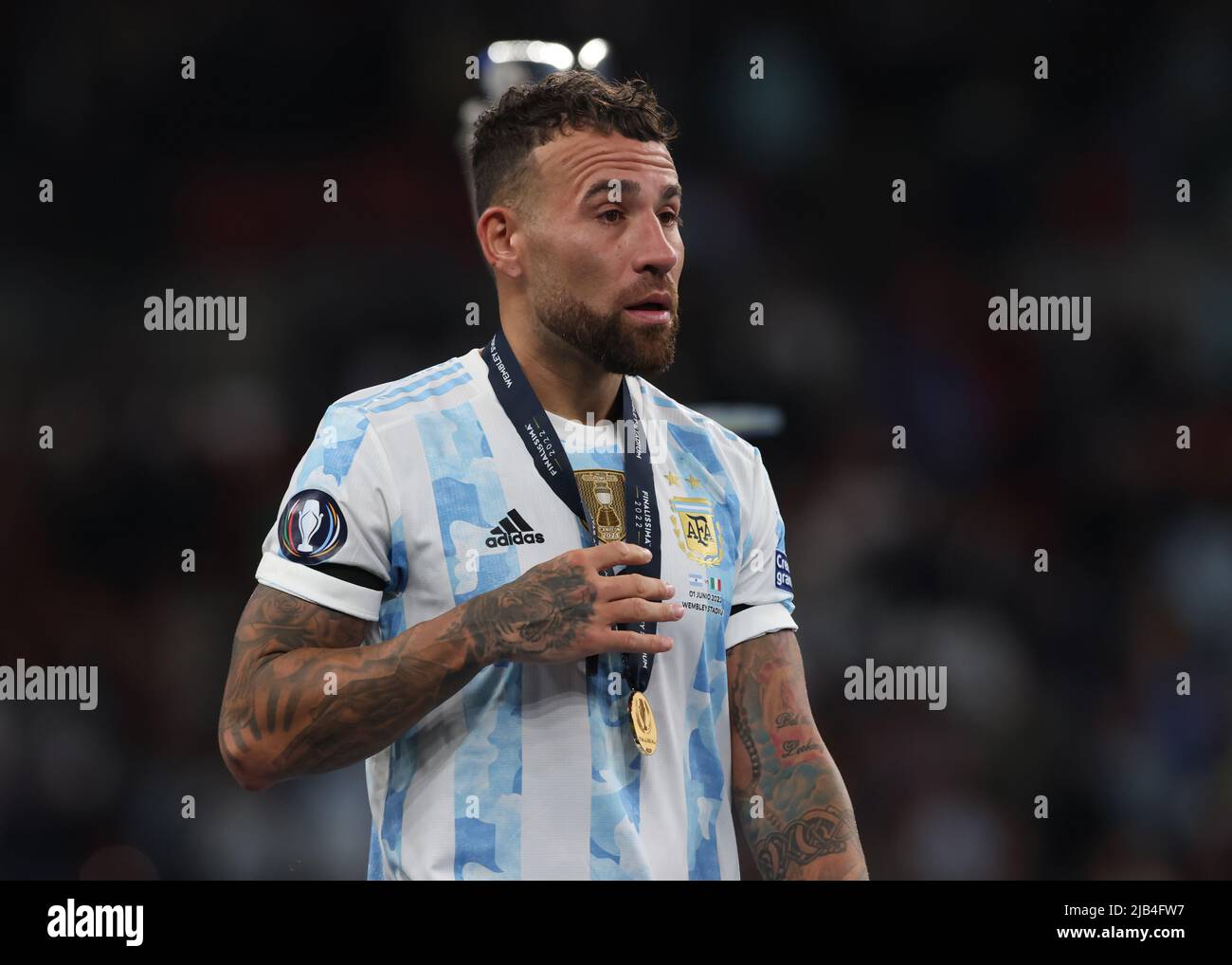 London, England, 1st June 2022. Nicolas Otamendi of Argentina reacts after collecting his winners' medal during the trophy presentation of the CONMEBOL-UEFA Cup of Champions match at Wembley Stadium, London. Picture credit should read: Jonathan Moscrop / Sportimage Credit: Sportimage/Alamy Live News Stock Photo