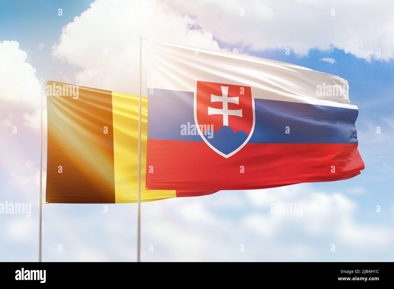 Sunny blue sky and flags of slovakia and belgium Stock Photo - Alamy