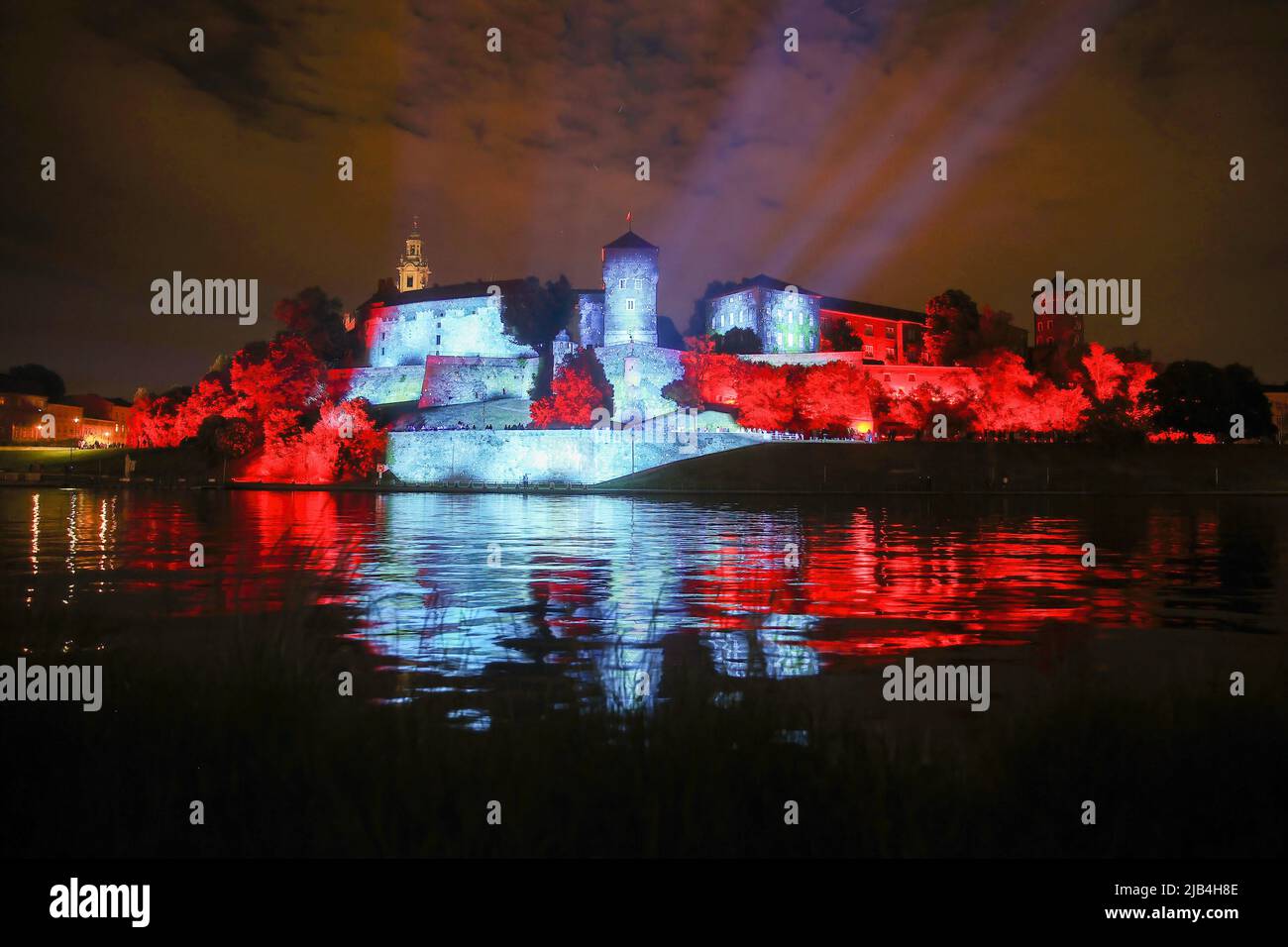 A night view of Wawel Castle illuminated with themes from the TV-show 'Stranger Things', as a part of a promotion campaign for the latest season. Stock Photo