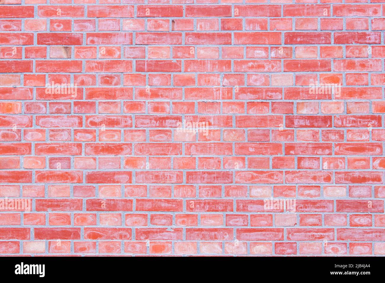 Plain old brick wall image. The wall in image is faded and sooty. Stock Photo
