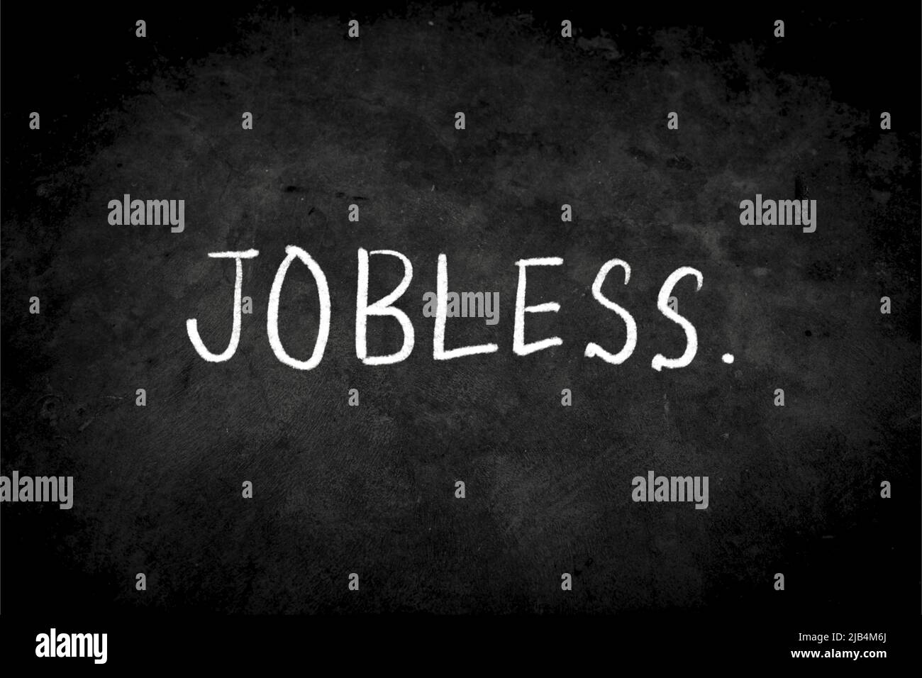 Close up phrase "JOBLESS" by handwriting white coloured chalk on