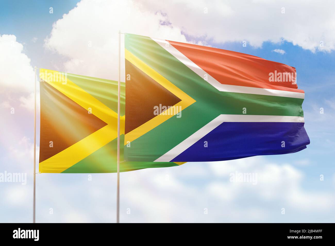 Sunny blue sky and flags of south africa and jamaica Stock Photo Alamy