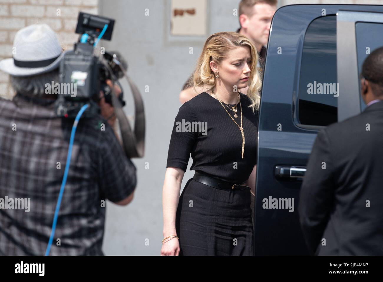 Amber Heard departs the Fairfax County Courthouse, in Fairfax, Virginia, after the verdict was announced in the civil trial with Johnny Depp, Wednesday, June 1, 2022. Depp brought a defamation lawsuit against his former wife, actress Amber Heard, after she wrote an op-ed in The Washington Post in 2018 that, without naming Depp, accused him of domestic abuse. Photo by Cliff Owen/CNP/ABACAPRESS.COM Stock Photo