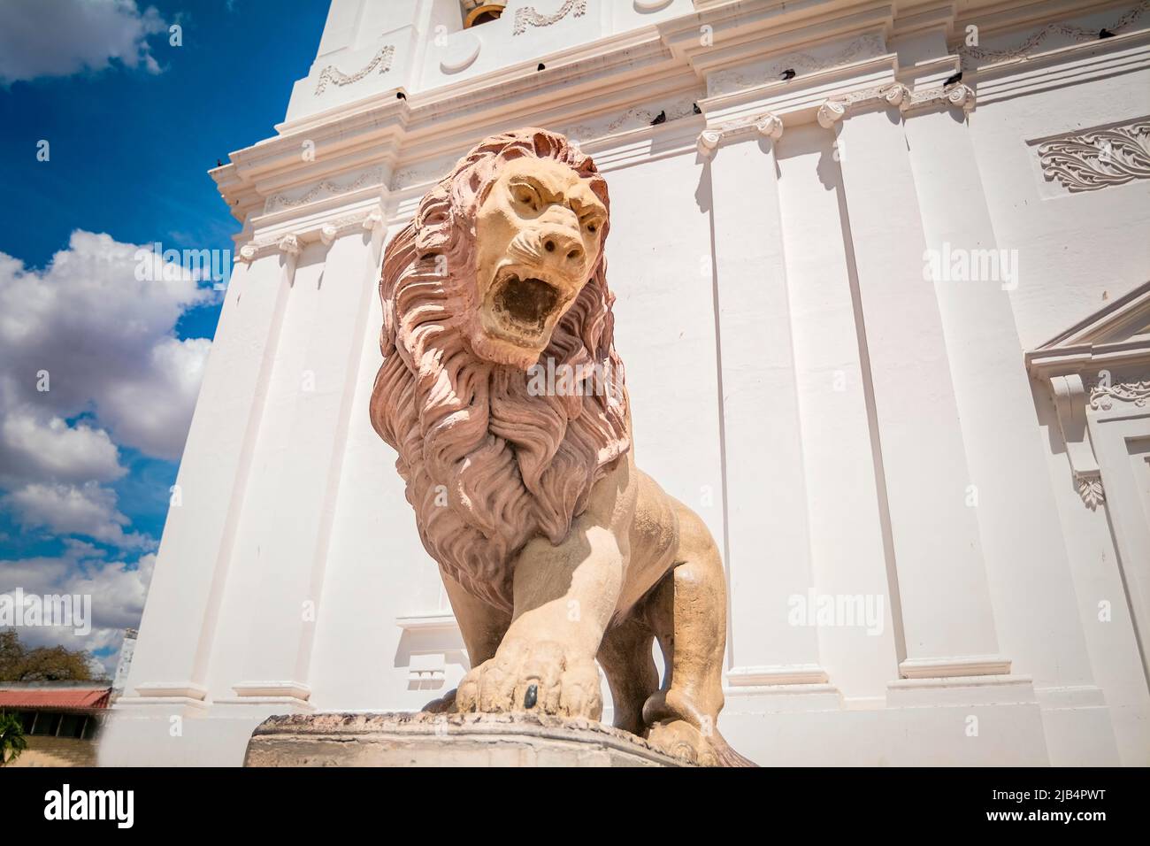 Monument of a lion, Lion statue near a church, lion statue in the city