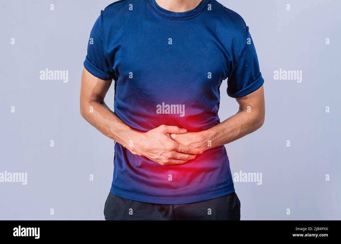 Person with stomach pain, stomach problems concept, man with digestive