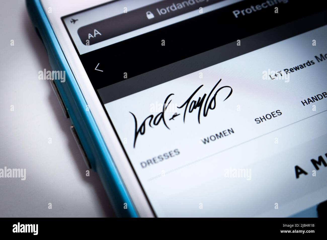 Website of Lord & Taylor, the oldest US department store chain, on iPhone. Lord & Taylor filed for Chapter 11 bankruptcy protection on Aug. 2, 2020 Stock Photo
