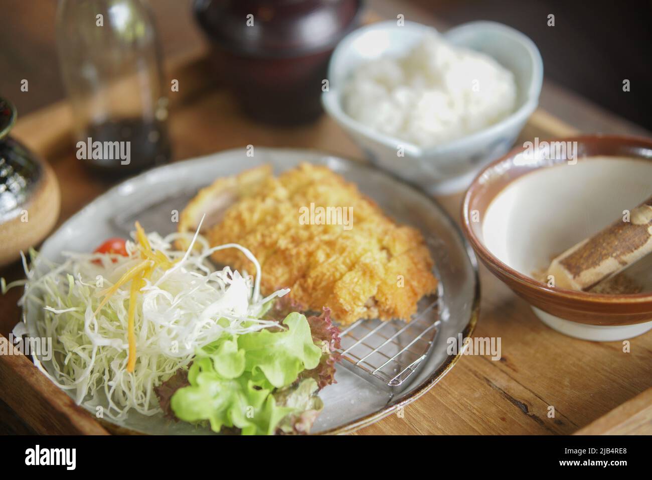 shredded cabbage with deep fried crispy pork cutlet rice japanese food Tonkatsu set Stock Photo