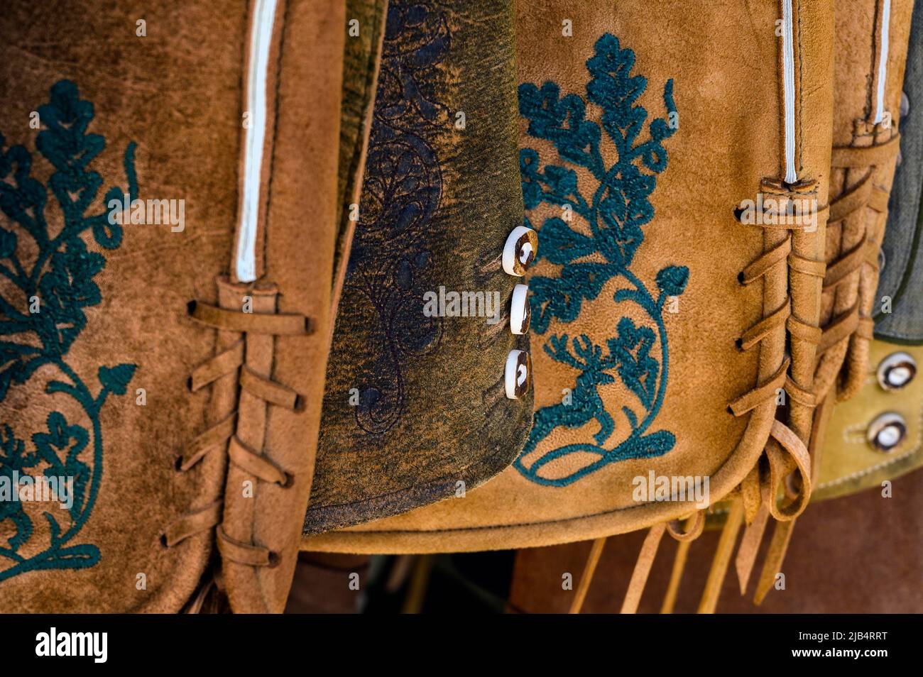 Embroidery and staghorn buttons on leather trousers, Oberstaufen, Allgaeu, Bavaria, Germany Stock Photo