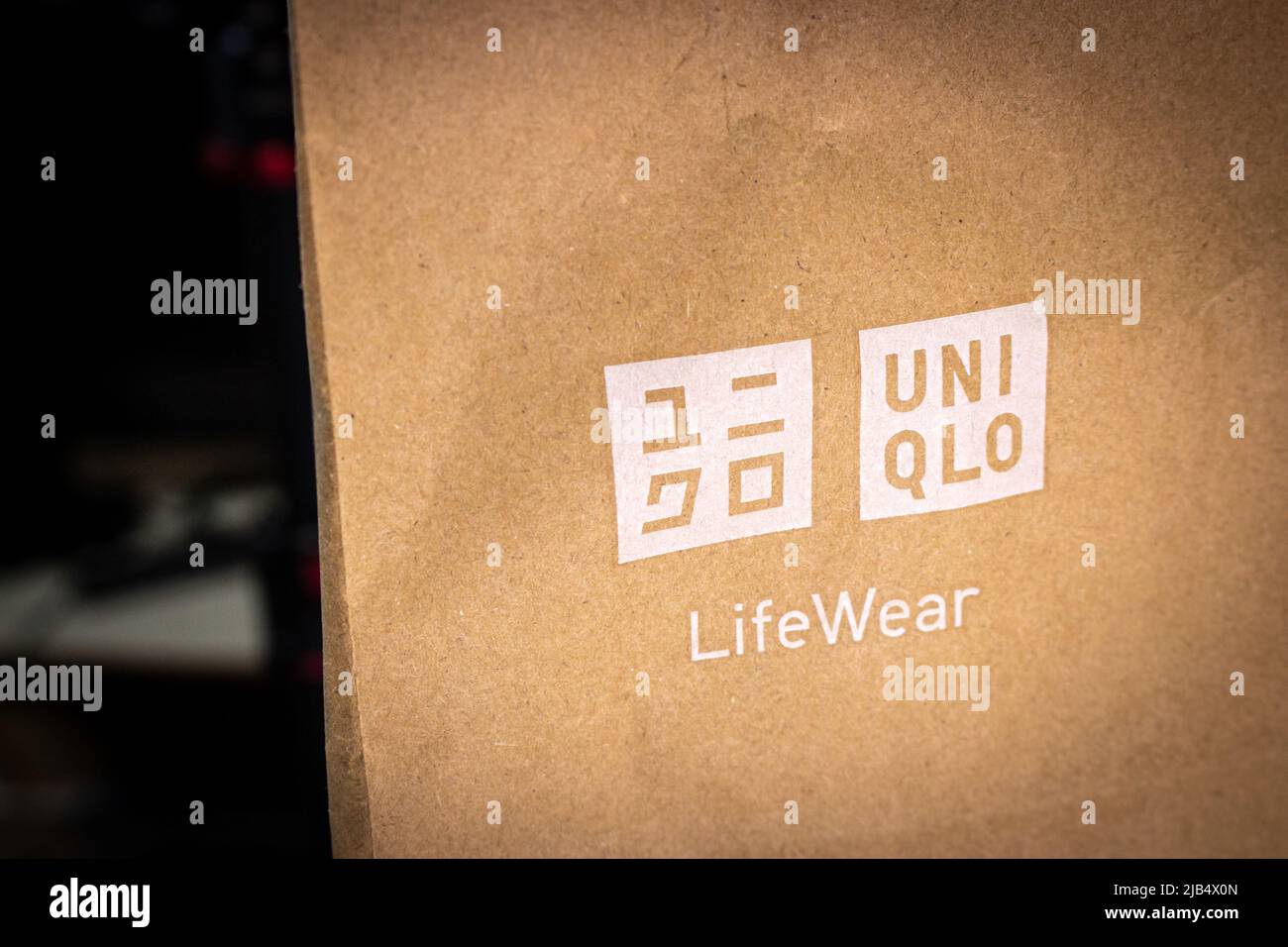 Kumamoto, Japan - Jul 29 2020 : Brand logo of UNIQLO, printed on brown  paper shopping bag. LifeWear is the product concept of UNIQLO Stock Photo -  Alamy