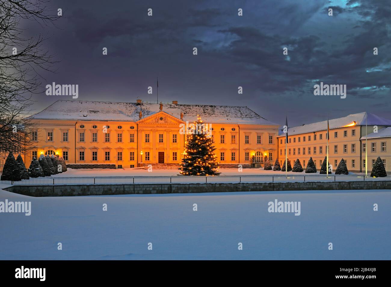 Bellevue Palace in the evening, seat of the German Federal President, with Christmas tree at Christmas time, Berlin, Germany Stock Photo
