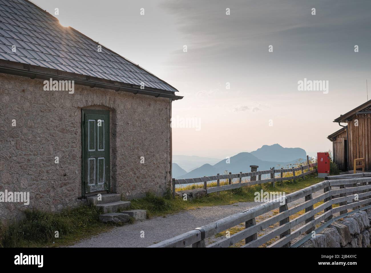 Intermediate station of narrow cog railway on the shafberg mountain in upper austria. Romantic view of old train track high up on the mountain. Stock Photo