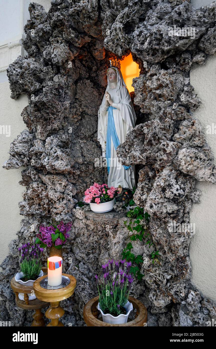 Lourdes Grotto with Madonna figure, St. Peter and Paul's Parish Church, 'Cathedral of the Western Allgaeu', neo-baroque church from 1914 Stock Photo