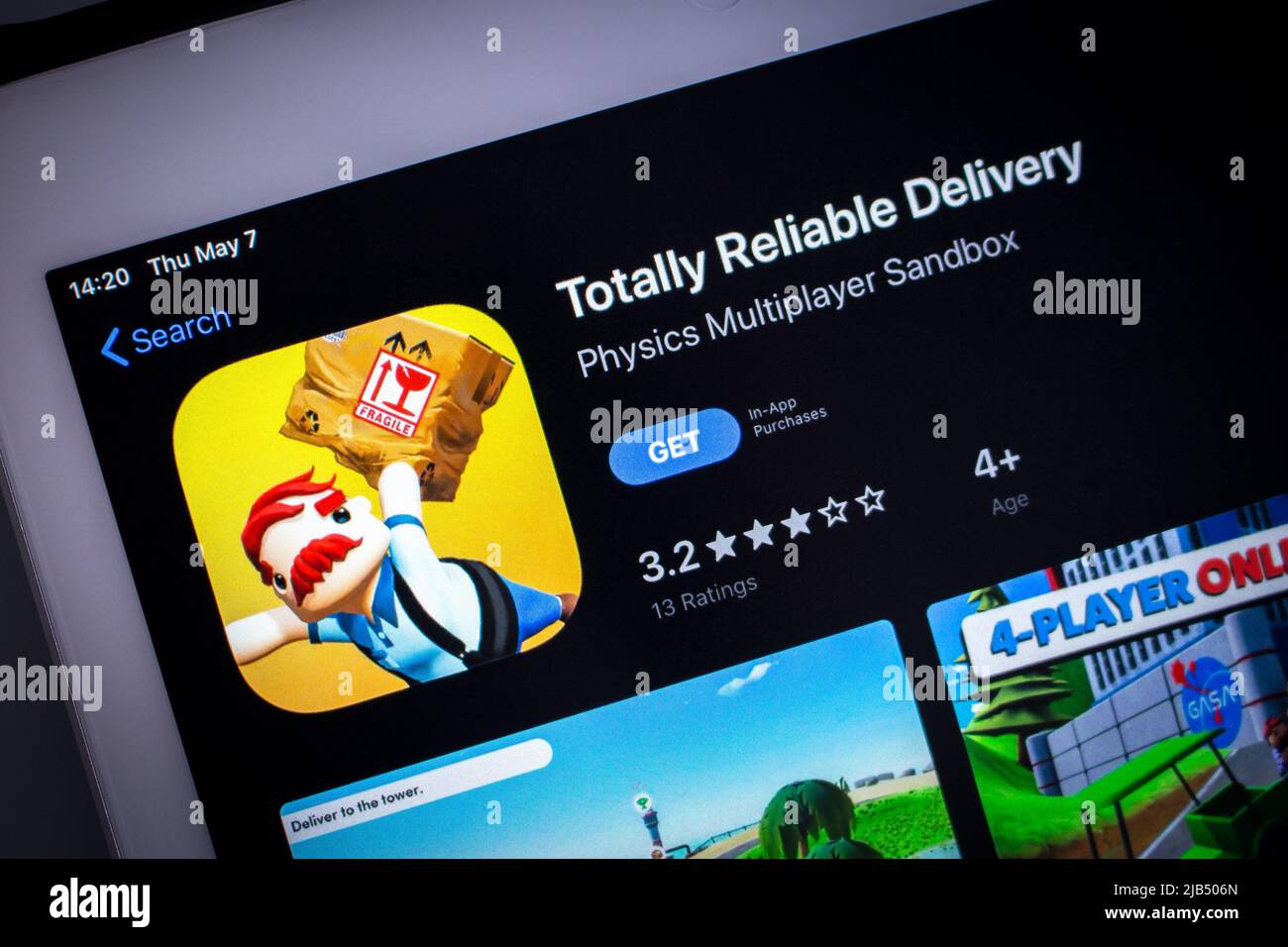 Kumamoto, Japan - May 7 2020 : Totally Reliable Delivery Service app, by US video game publisher & developer tinyBuild LLC, in App Store on iPad Stock Photo