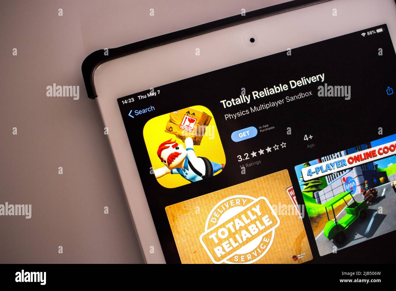 Kumamoto, Japan - May 7 2020 : The image of Totally Reliable Delivery Service app, by US video game publisher & developer tinyBuild LLC, in App Store Stock Photo