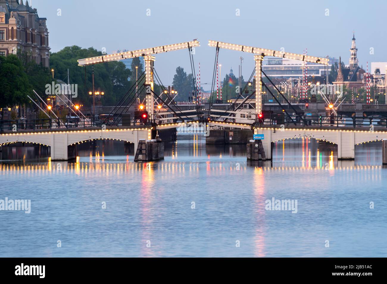 Magere Brug, illuminated Dutchman's Bridge, Kerkstraat, River Amstel, Amsterdam, Netherlands Stock Photo
