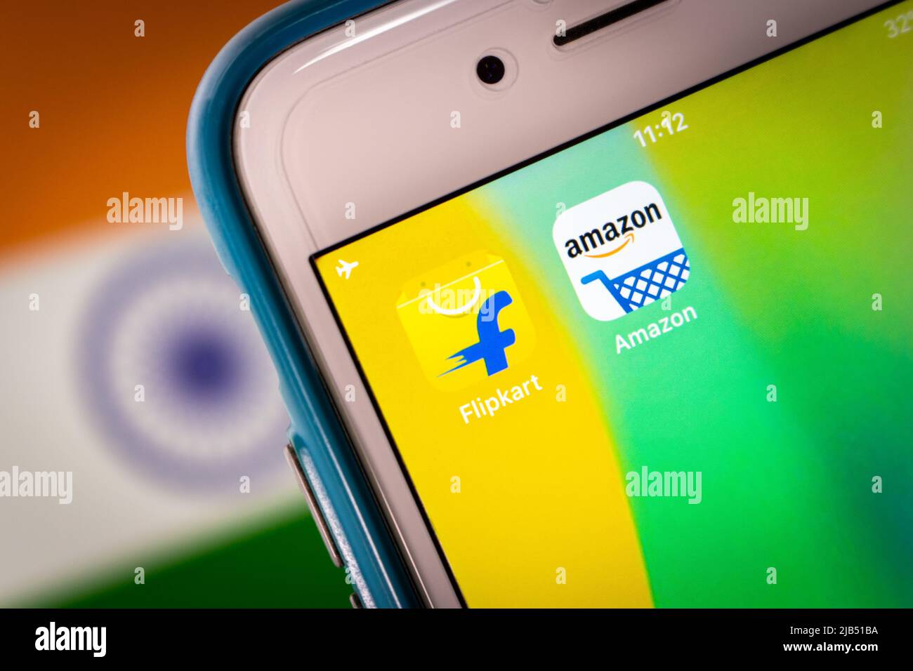 Flipkart, an company based in Karnataka, India, with Amazon on iPhone with Indian flag. Flipkart & Amazon are No. 1 / 2 online retailer in India Stock Photo