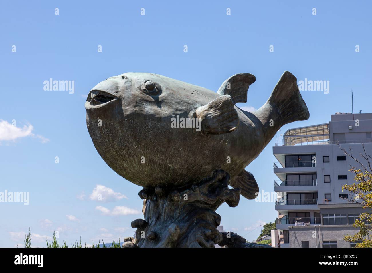 Famous statue of Fuku (Fugu / Puffier Fish) at Kameyama Hachimangu Shrine. Shimonoseki is the largest harvester of the pufferfish in Japan Stock Photo