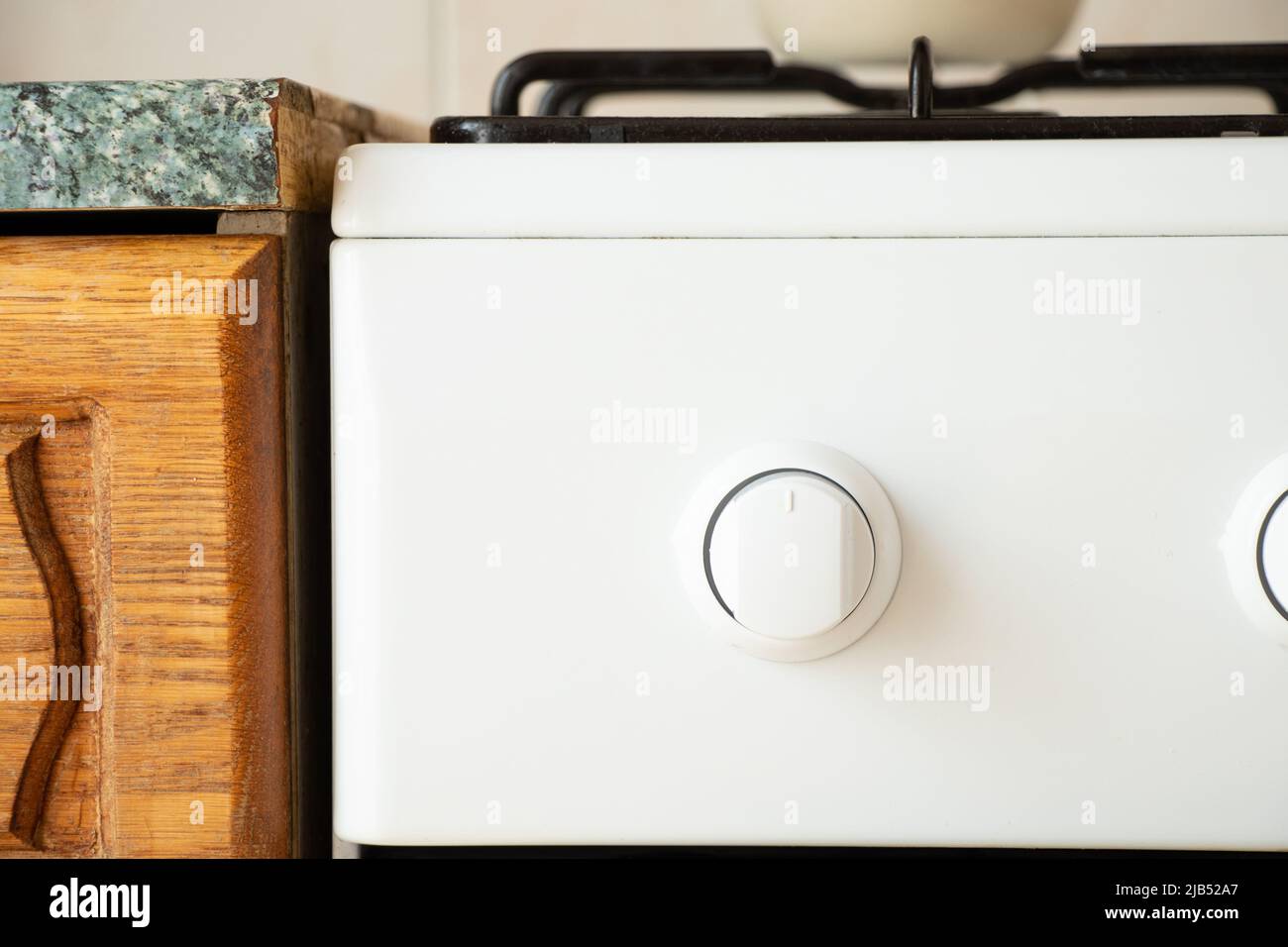 Gas stove and kitchen worktop in the kitchen of the house closeup