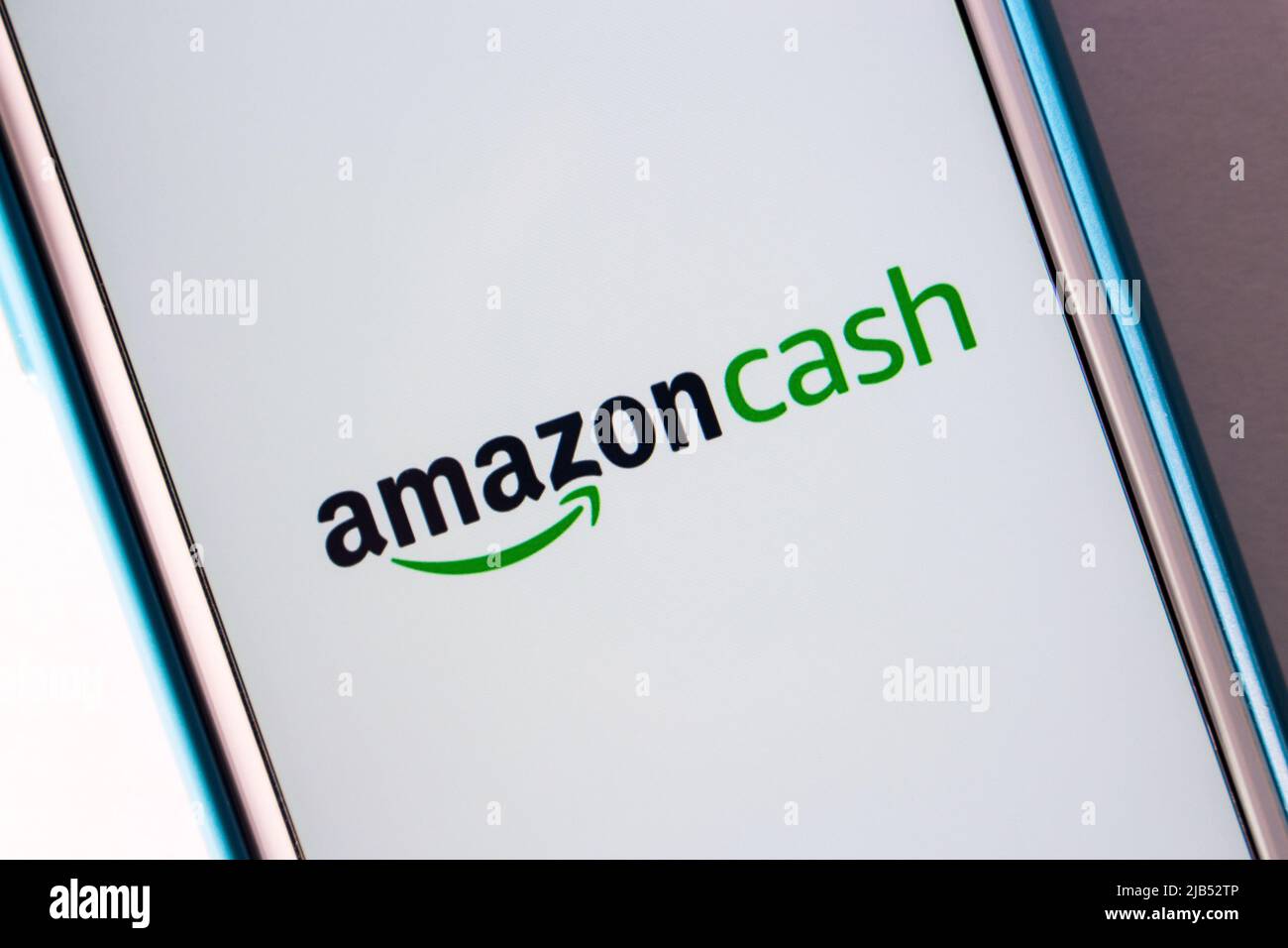 Kumamoto / JAPAN - Oct 12 2020 : Close up logo of Amazon Cash (in the US and Canada, Top Us in the UK) on iPhone. The service allowing Amazon shoppers Stock Photo