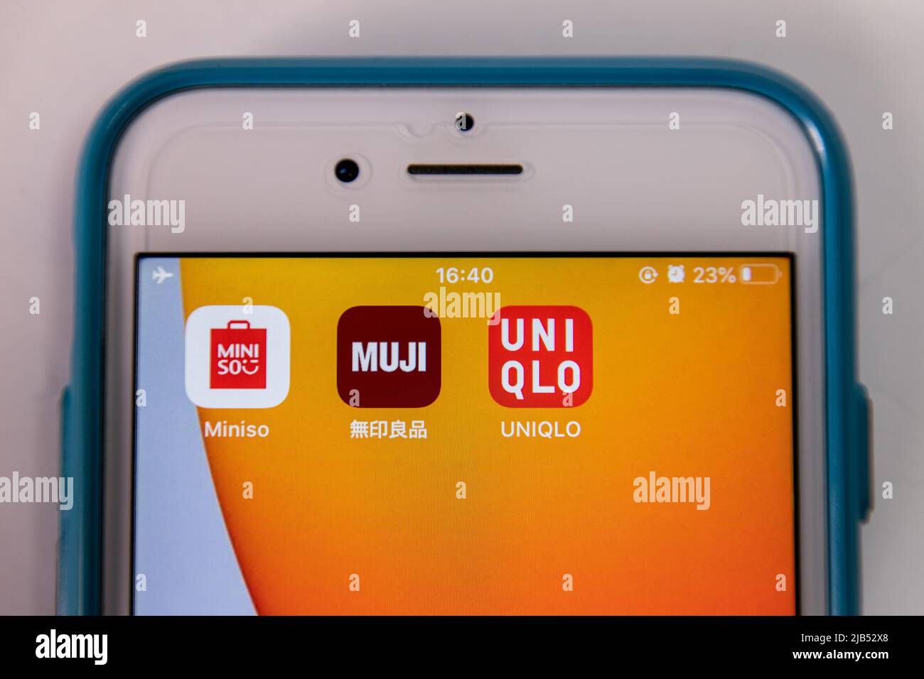 Icons of Miniso, MUJI & Uniqlo on iOS. Miniso often criticized as a copycat for sharing an similarity to other Japan’s brands Uniqlo, Daiso & Muji Stock Photo