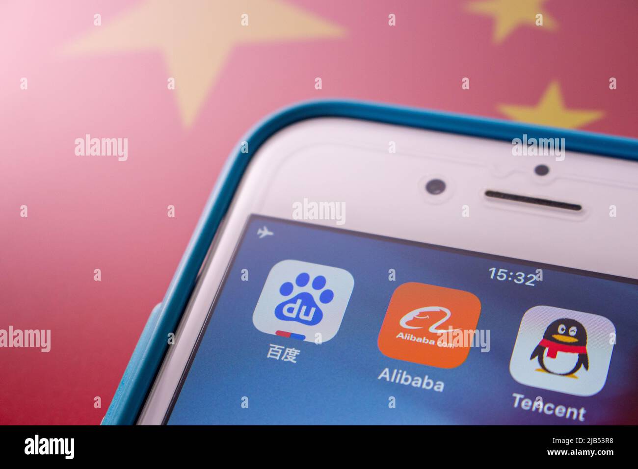 Kumamoto, JAPAN - Oct 2 2020 : Icons of China’s big tech giants (Baidu, Alibaba and Tencent) on iPhone with Chinese flag. Stock Photo
