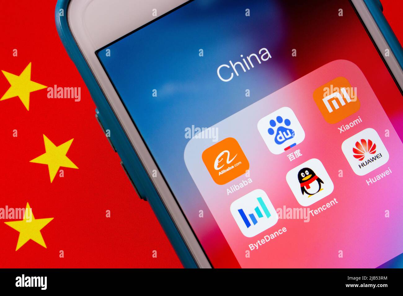 Kumamoto, JAPAN - Oct 2 2020: China's tech giants (The Big Six - Alibaba, Baidu, Tencent, ByteDance, Xiaomi and Huawei) on iPhone on Chinese flag Stock Photo