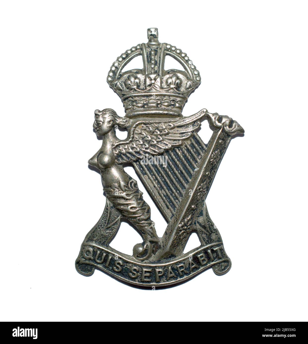 A cap badge of the Royal Irish Rifles later renamed the Royal Ulster Rifles c. 1913-1952. Stock Photo