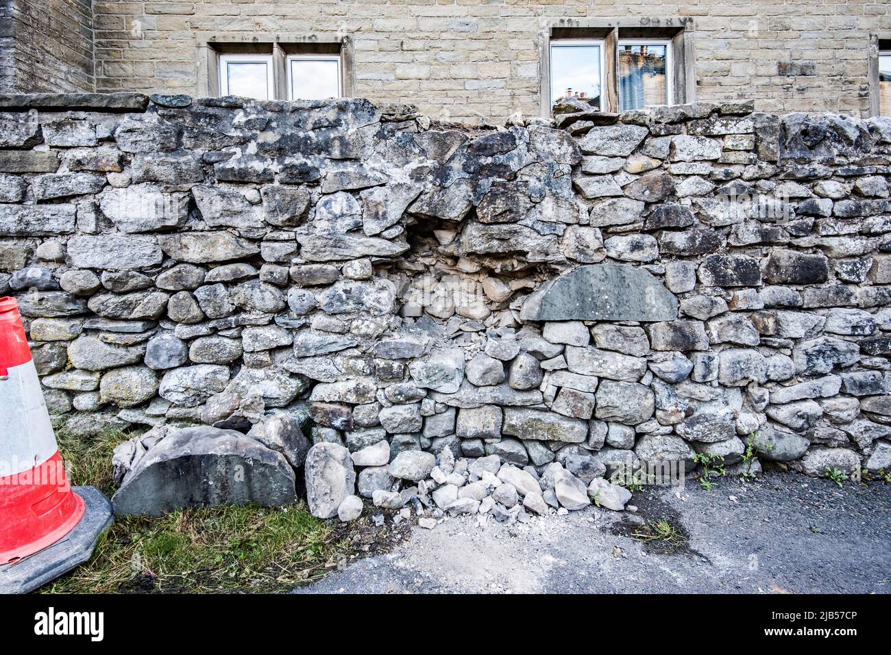 Partial collapse of a wall behind the Long Preston Village Hall, June
